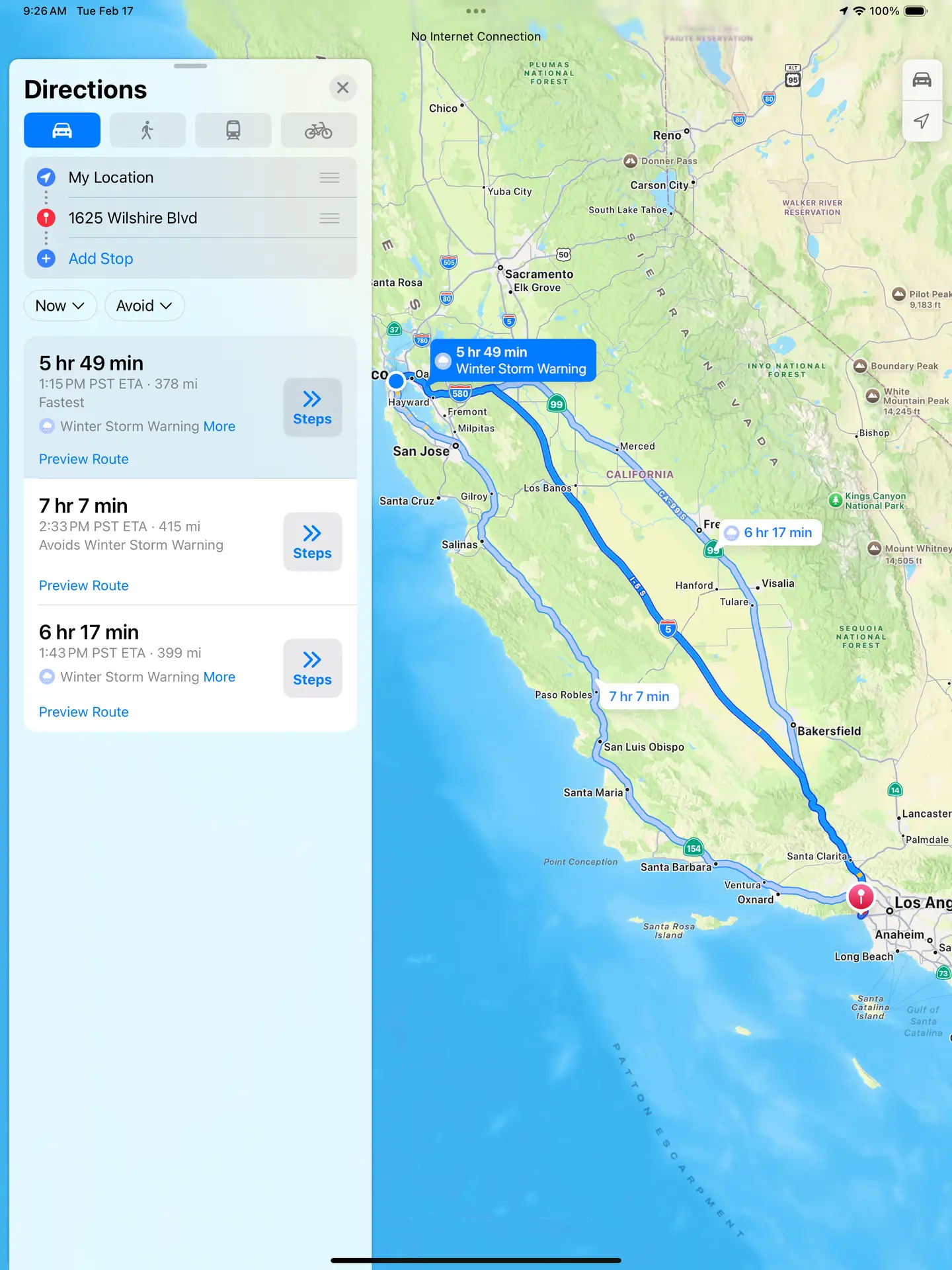 Apple Maps directions from My Location to 1625 Wilshire Blvd with route options and winter storm warning.